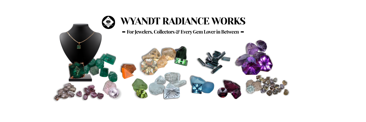 Wyandt Radiance Works display of gemstones and jewelry on a white background